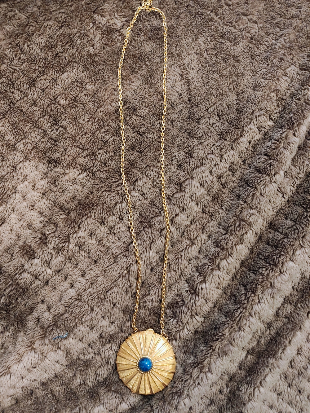 Estee Lauder Gold-Tone Sunburst Necklace with Blue Center